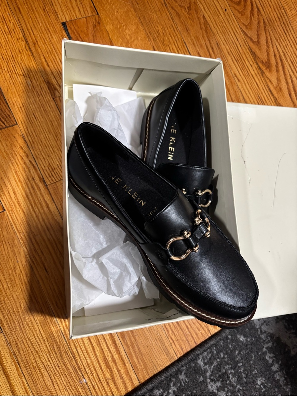 Anne Klein Black Smooth Loafers with Metal Accent
